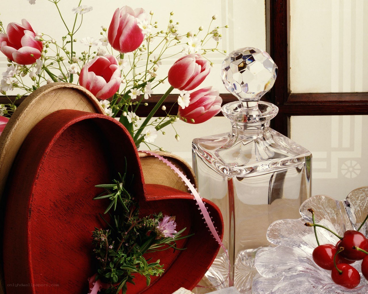 Flowers and perfume bottle