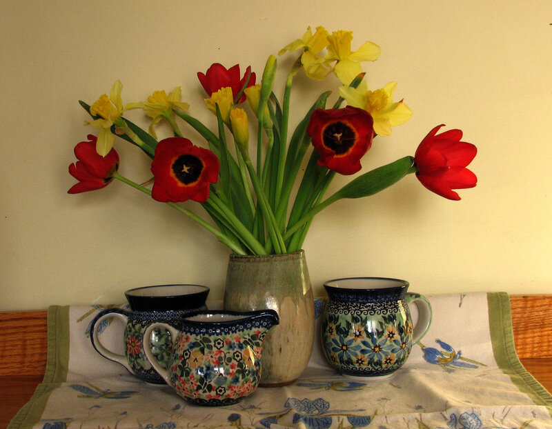 Flowers and pottery on a table