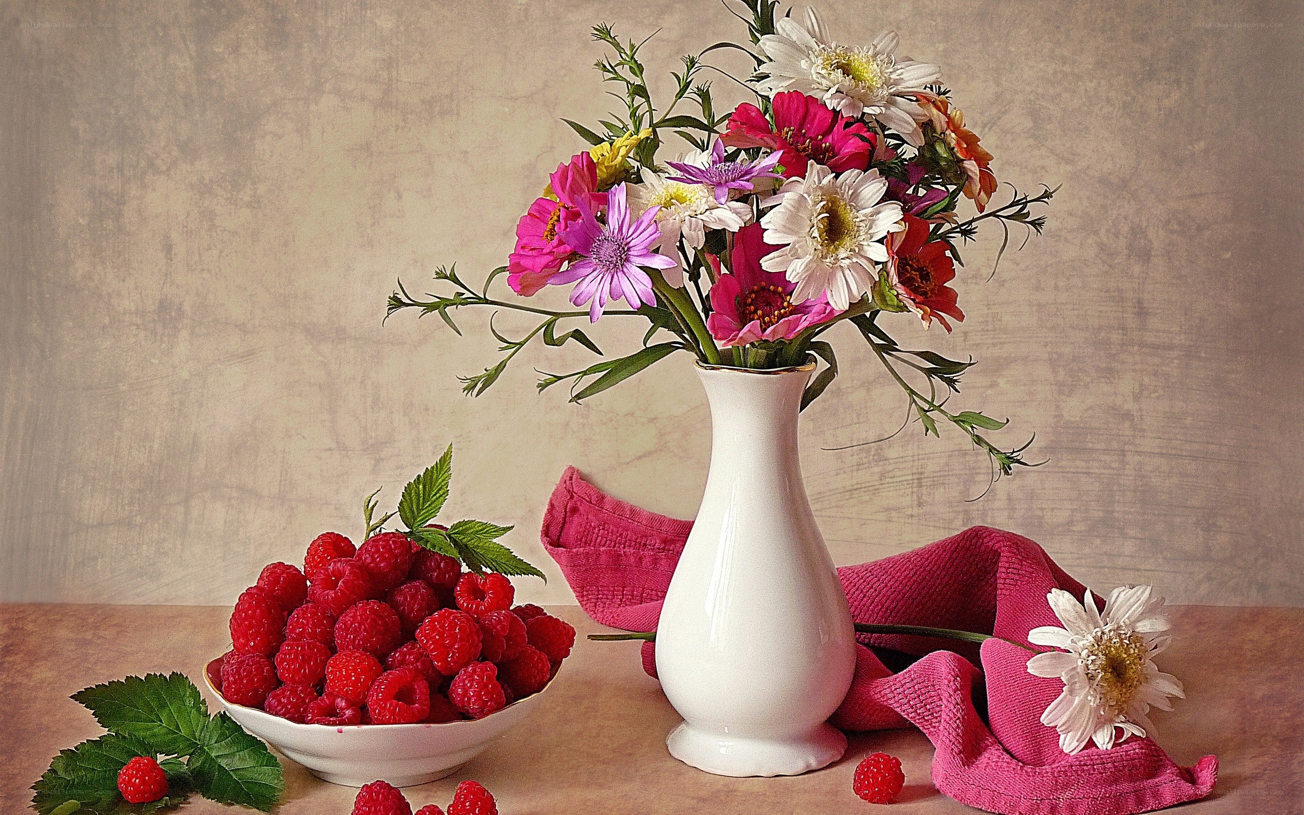 Flowers and raspberries still life