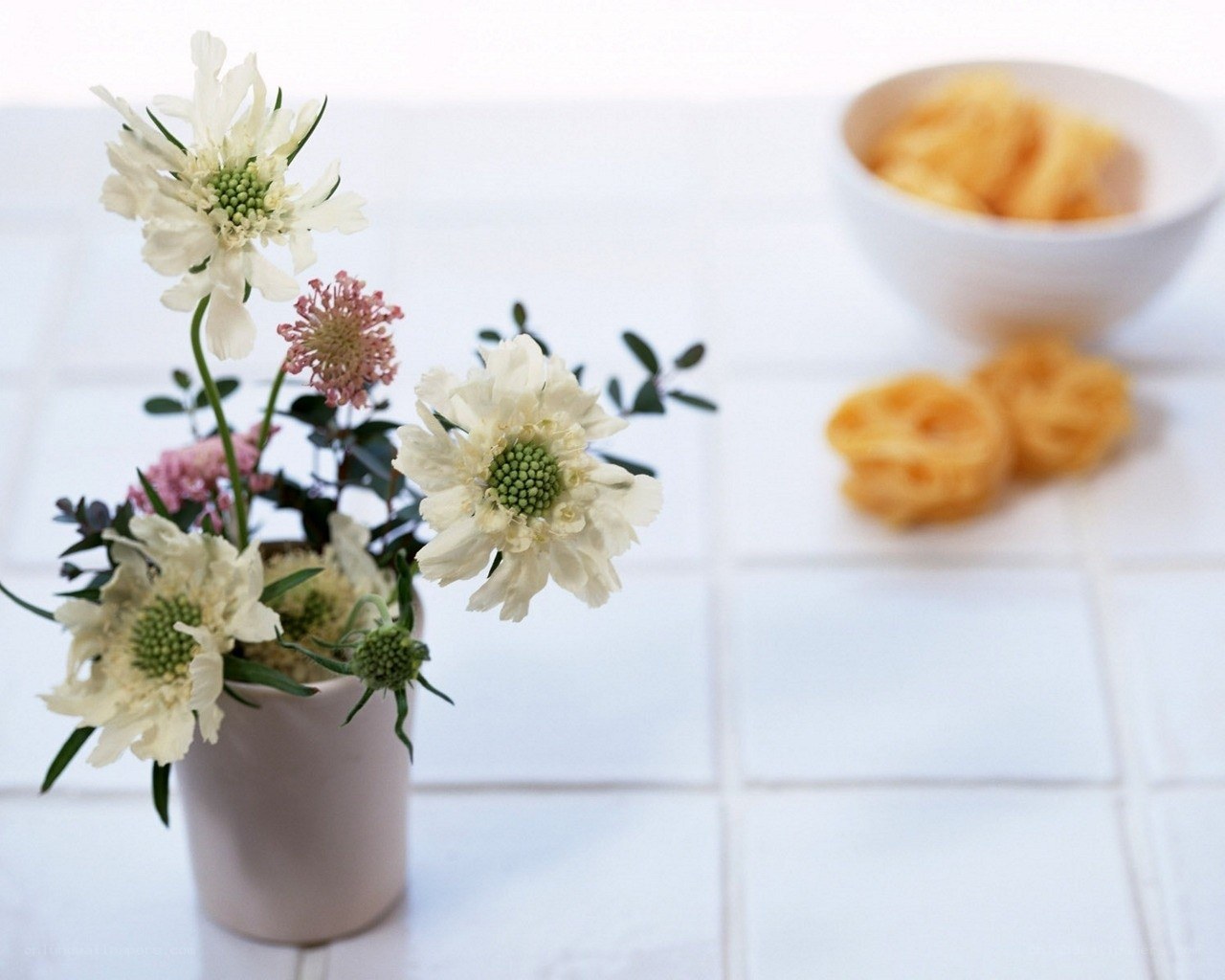 Flowers and snacks on a table