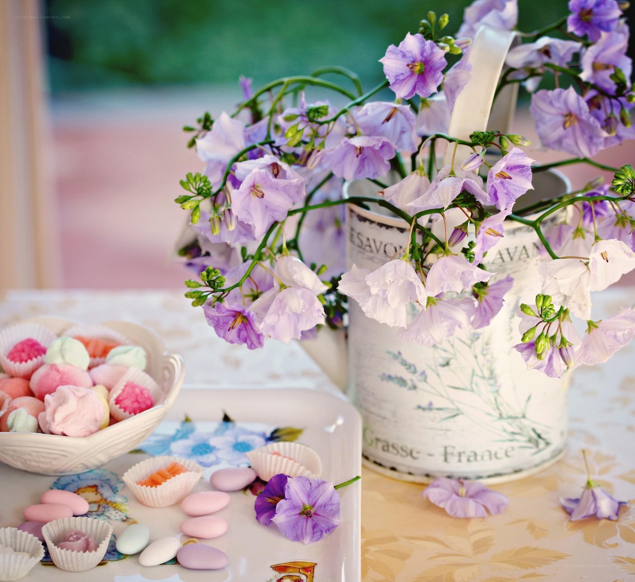 Flowers and sweets on a table