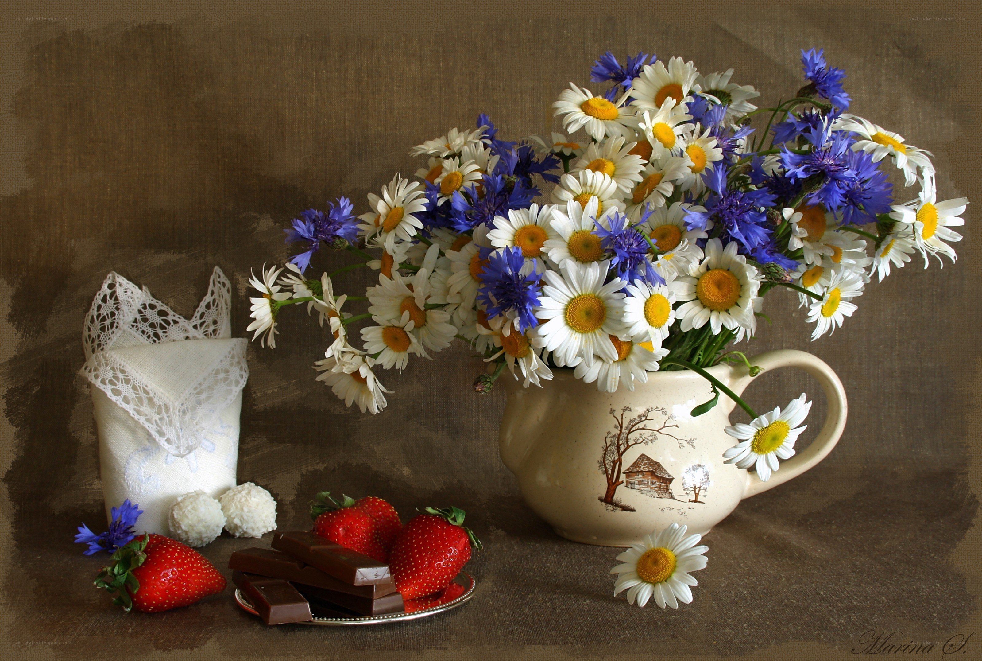 Flowers and sweets still life