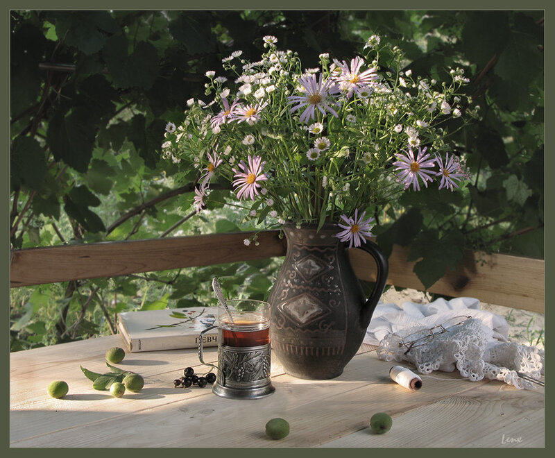 Flowers and tea on a wooden table