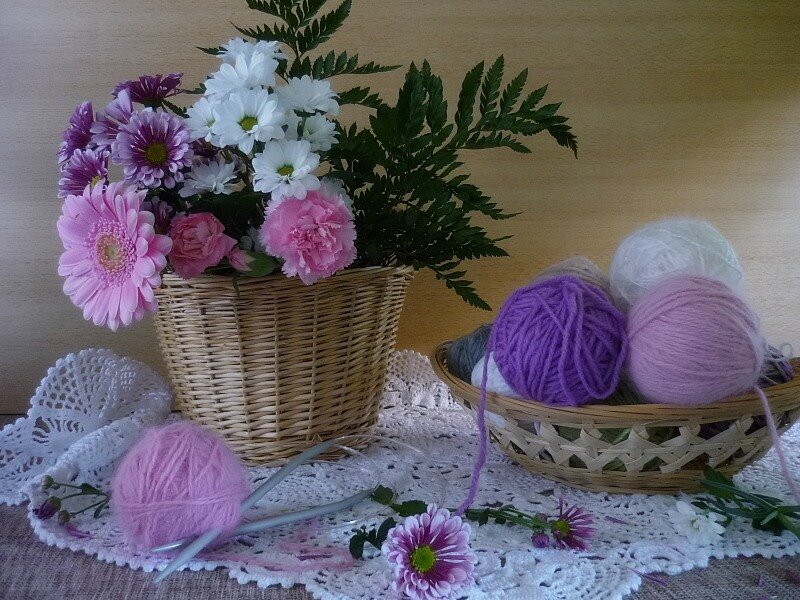 Flowers and yarn in baskets