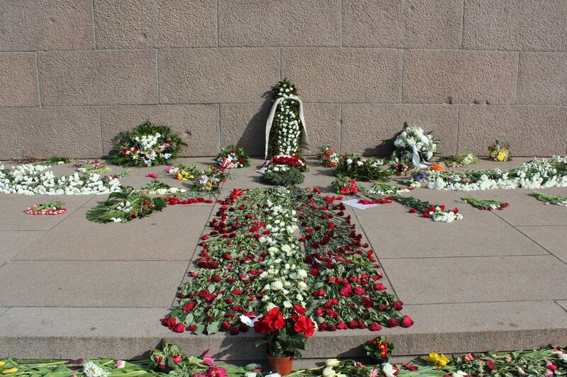 Flowers at Memorial — Red, Solemn