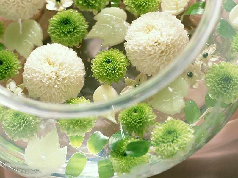 Flowers floating in a glass bowl