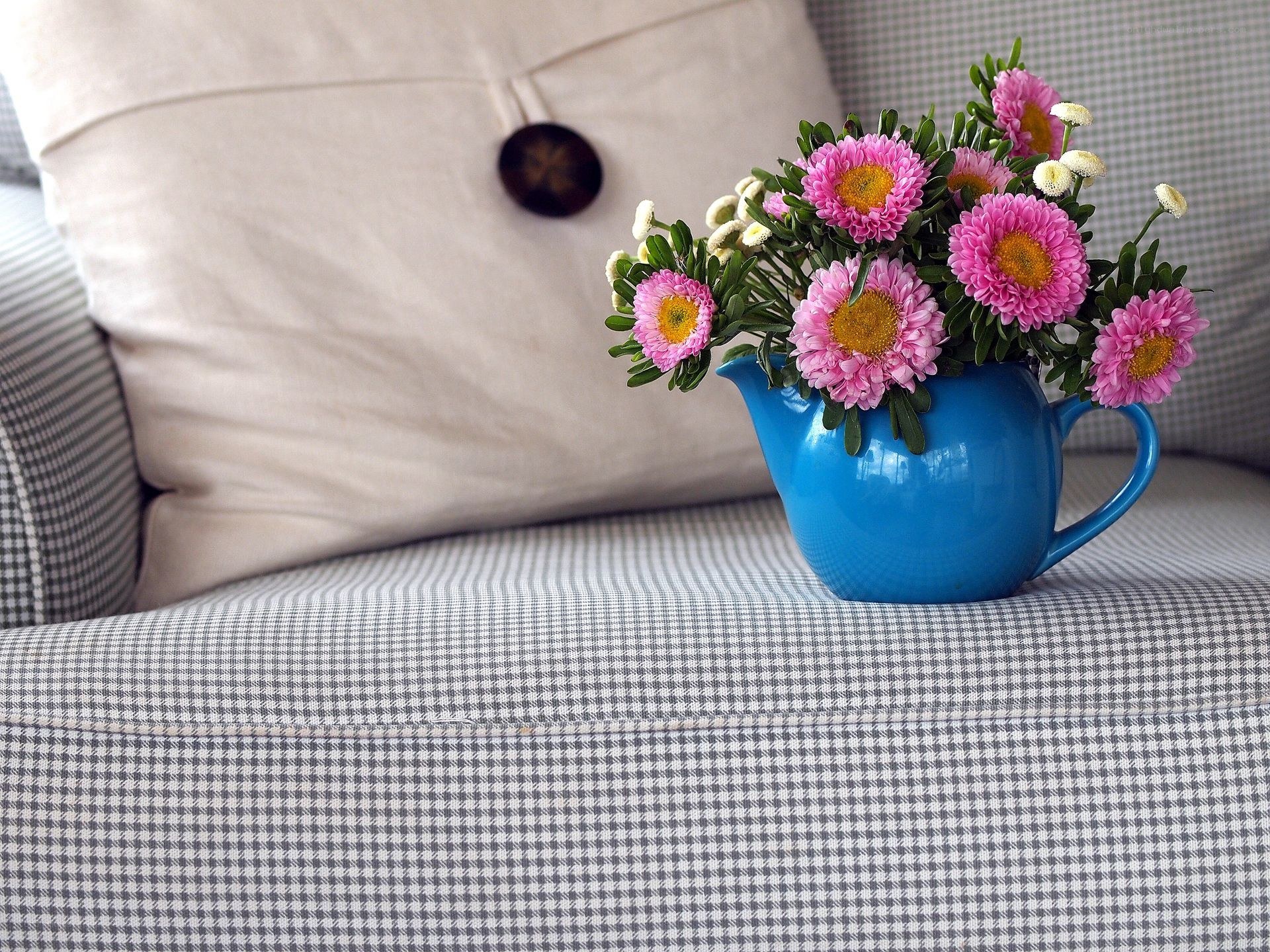 Flowers in a blue pitcher