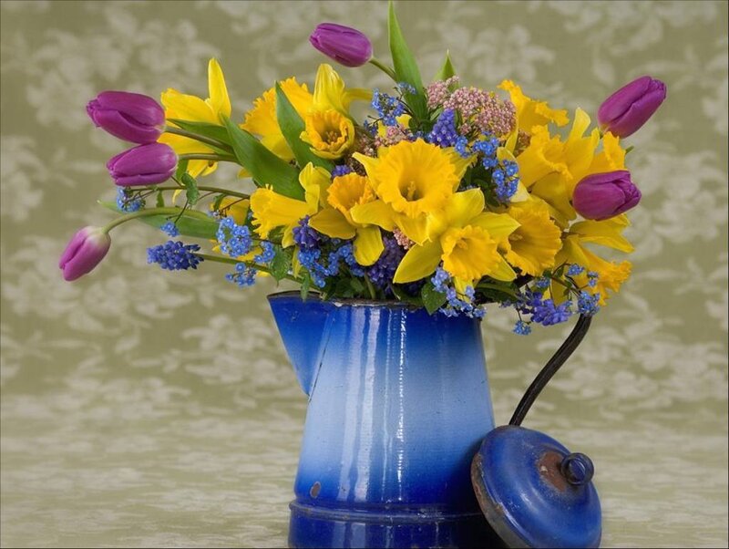 Flowers in a blue pitcher