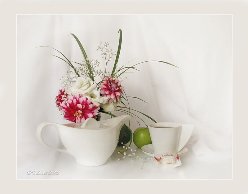 Flowers in a white pitcher
