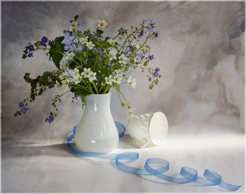 Flowers in a white vase