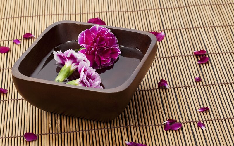 Flowers in a wooden bowl
