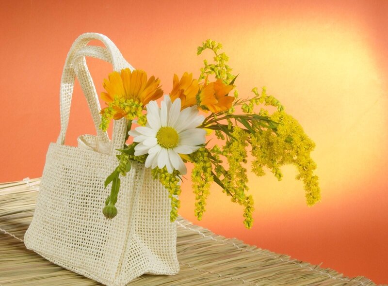 Flowers in a woven bag