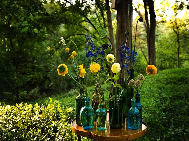 Flowers in Glass Bottles