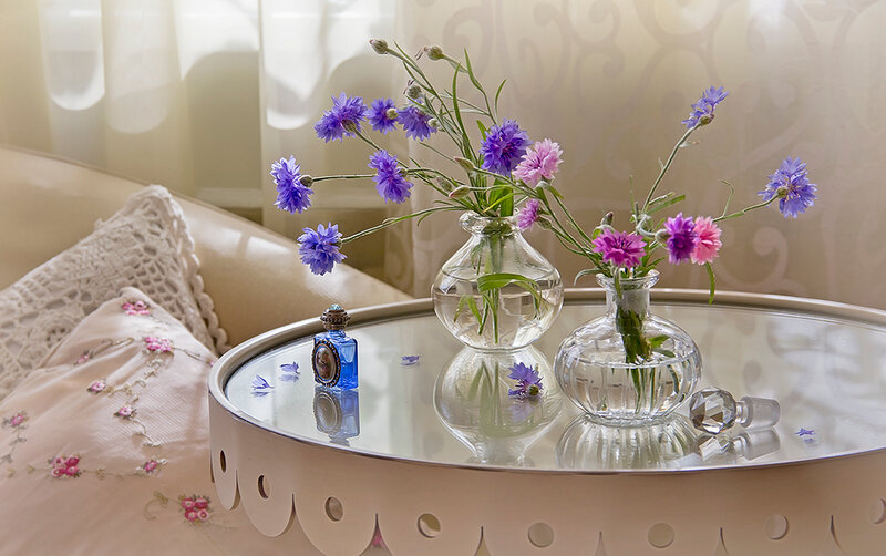 Flowers in Vases on Table