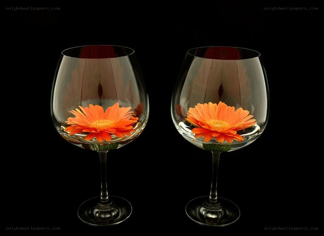 Flowers in wine glasses