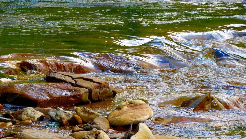 Flowing River over Rocks — Green
