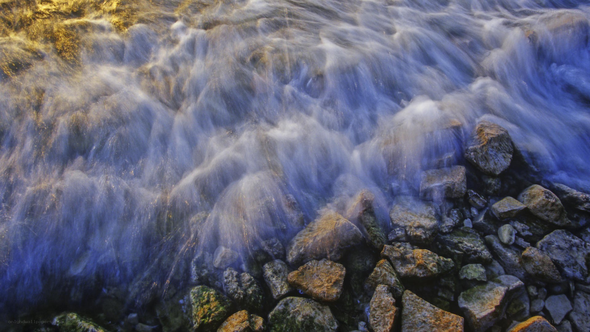 flowing water over rocks