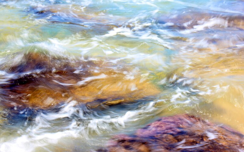 Flowing Water over Rocks — Blue