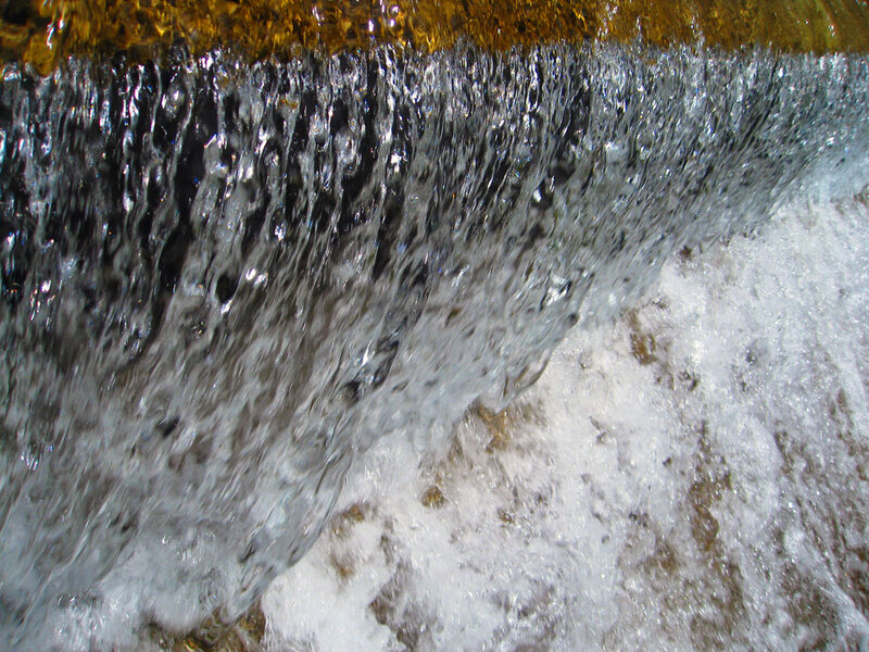 Flowing Water over Rocks — White