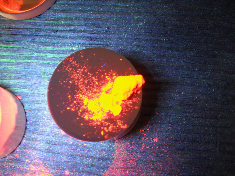 fluorescent powder on a disc