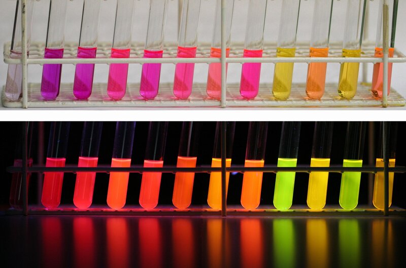 Fluorescent test tubes in lab