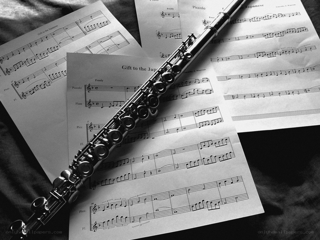 Flute on sheet music