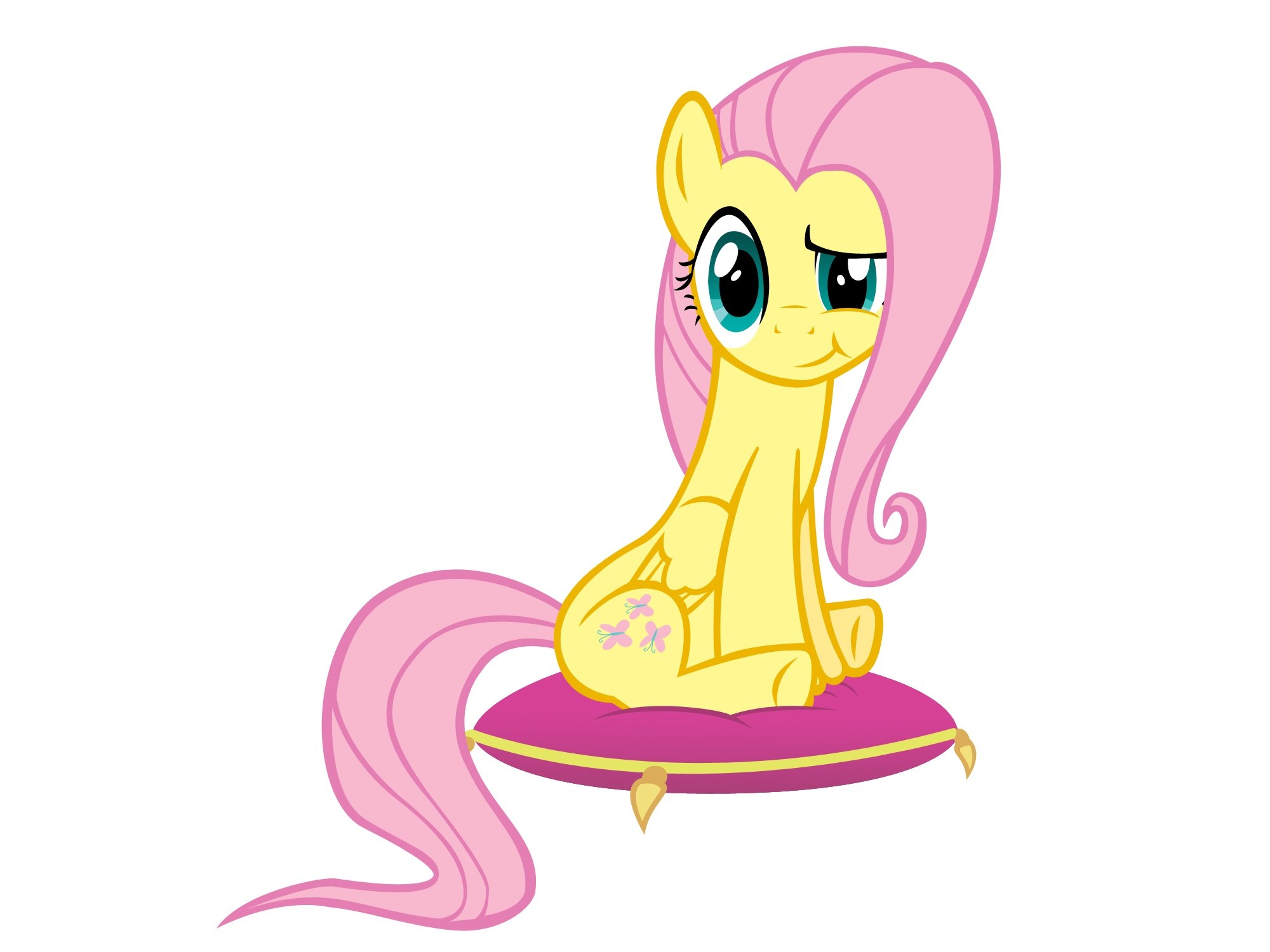 Fluttershy sitting on a pillow