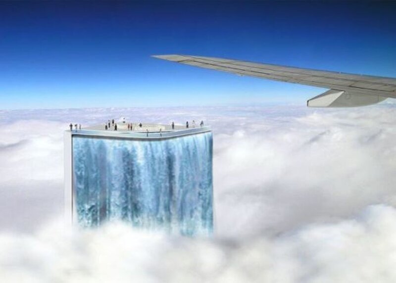 flying over a cloud-top waterfall