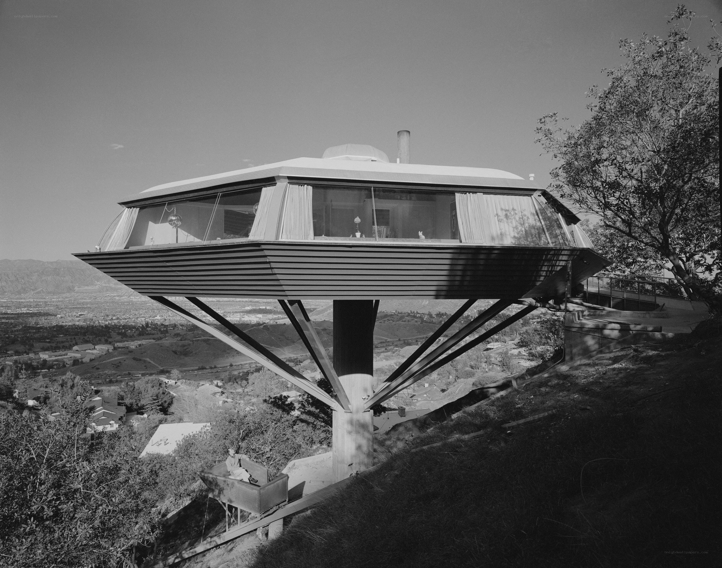 flying saucer house on hillside