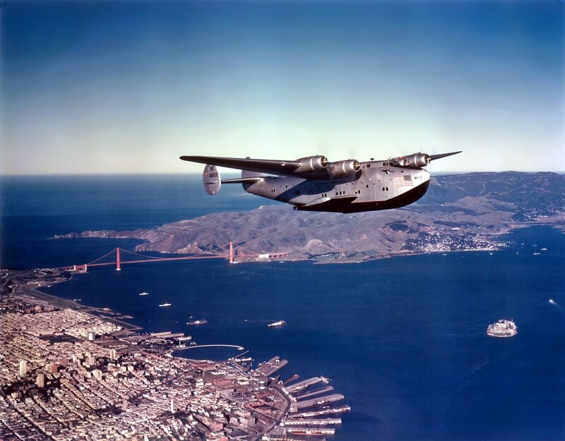 Flying Seaplane over Bay