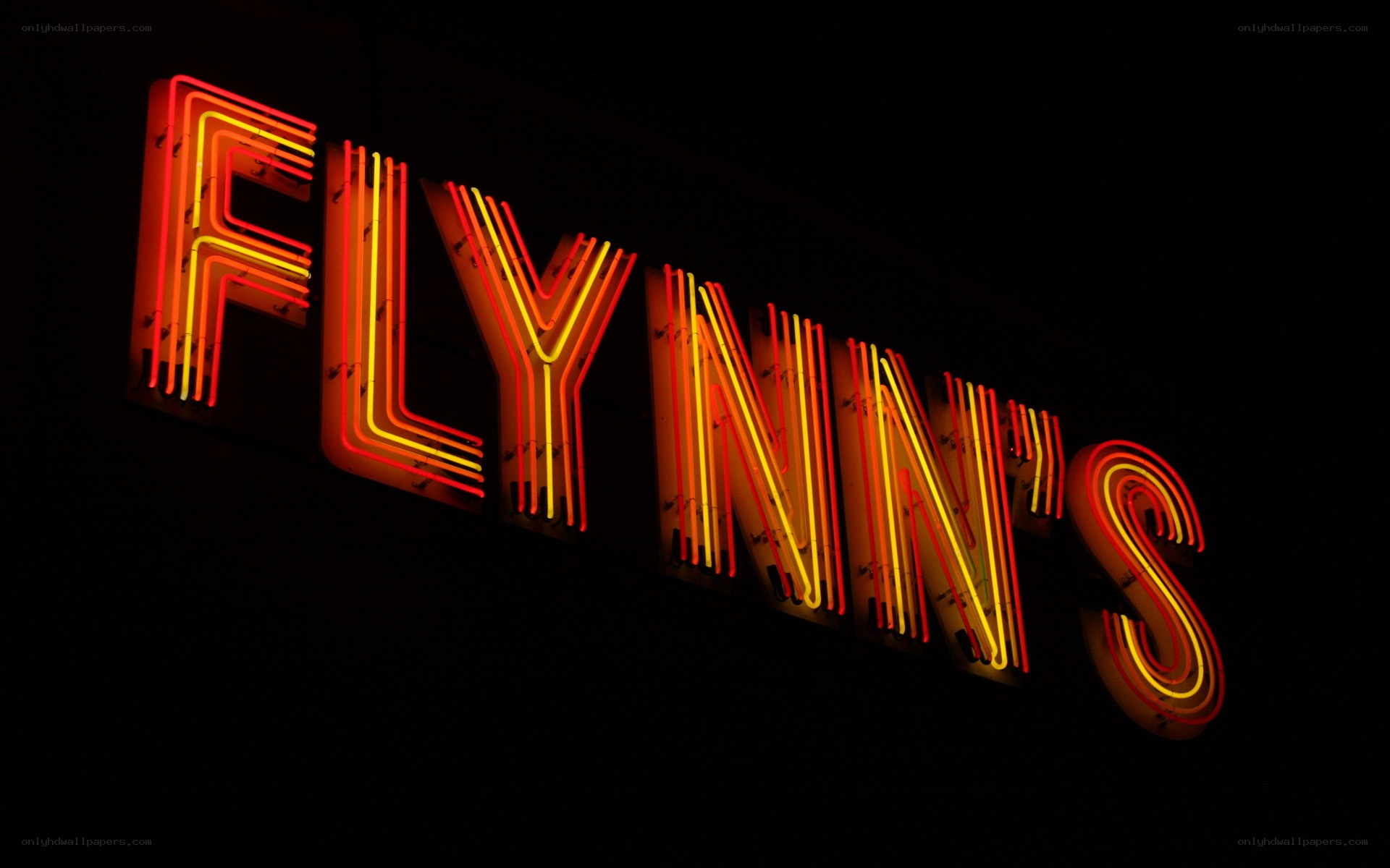 Flynn's neon sign at night