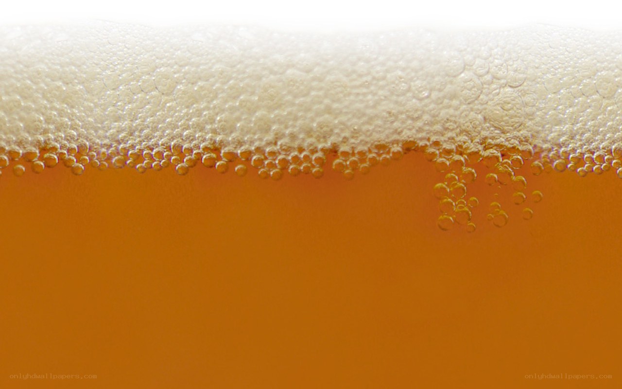 foamy beer head close-up