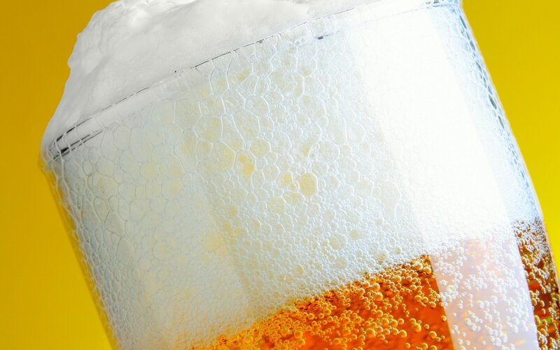 foamy beer in a glass