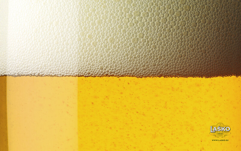 Foamy Beer in Glass — Yellow