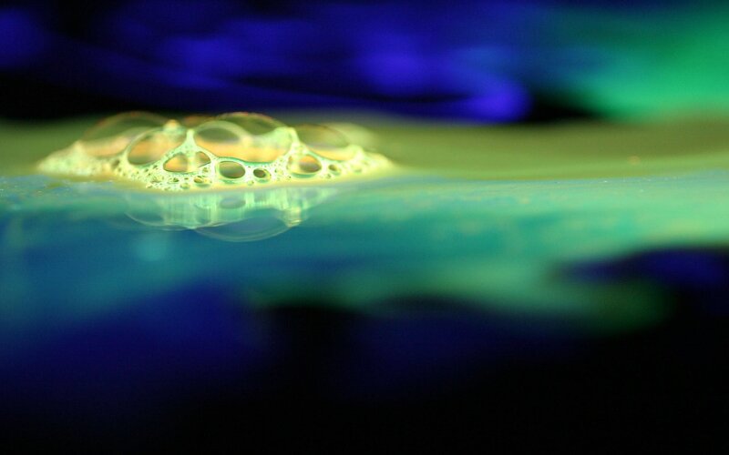 foamy bubbles on water surface