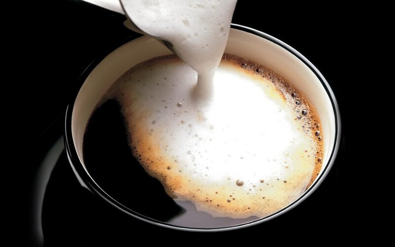 Foamy Milk Being Poured