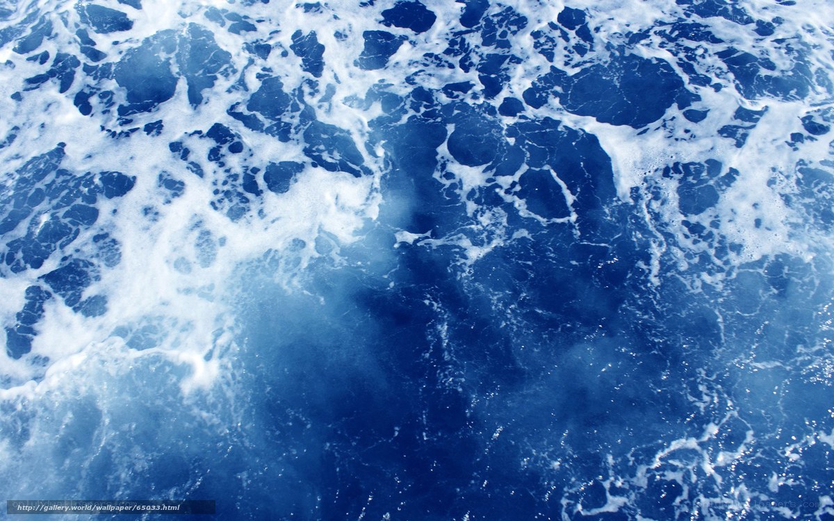 foamy ocean water from above