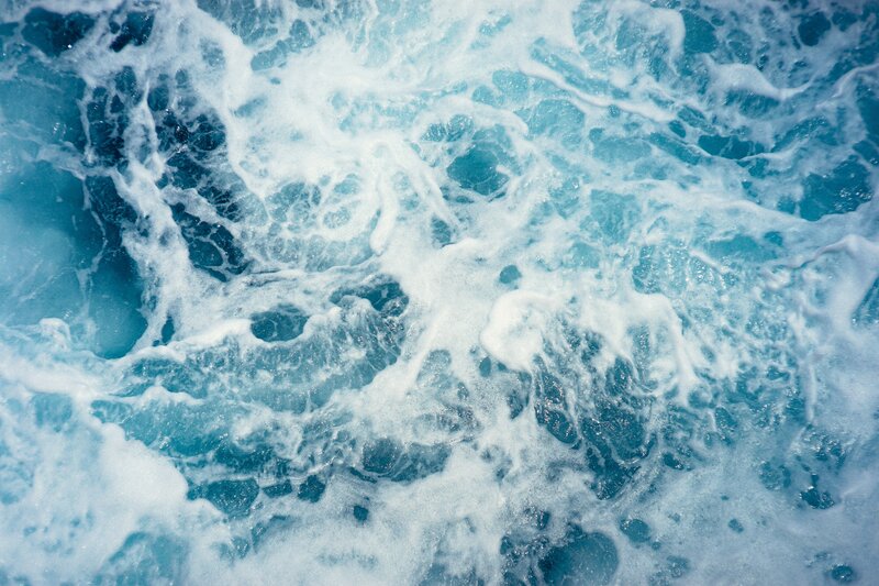 foamy ocean water surface