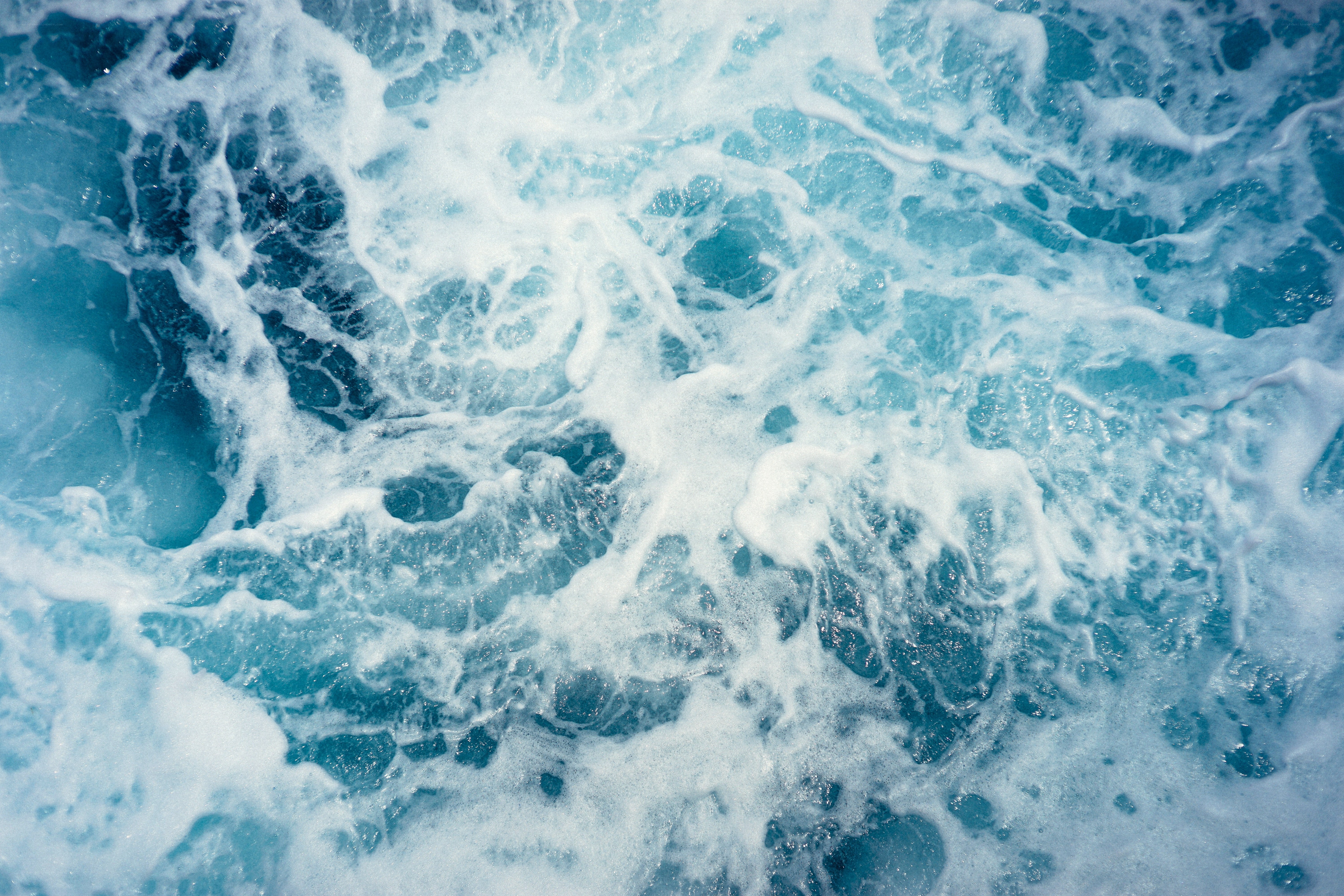 foamy ocean water surface