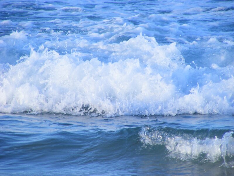 foamy ocean waves crashing
