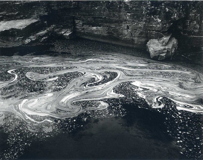 foamy water patterns on rocks