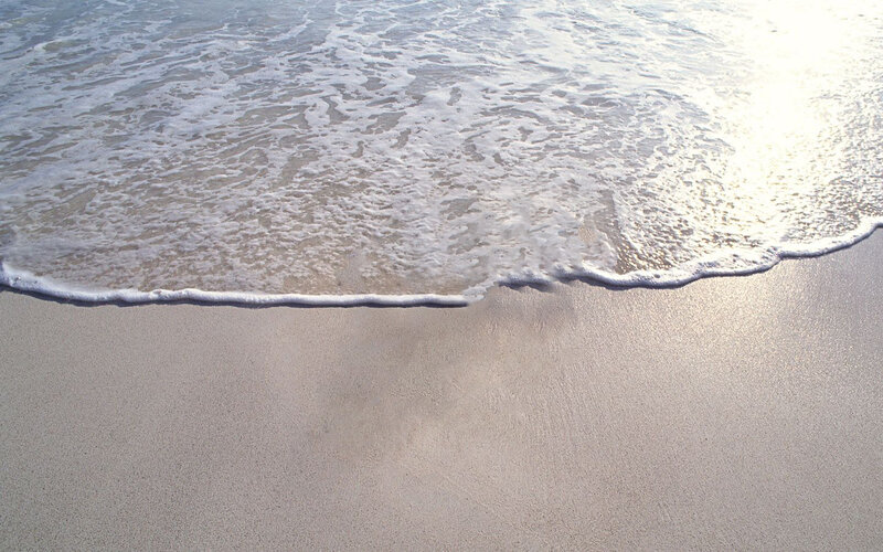 Foamy Wave on Sand
