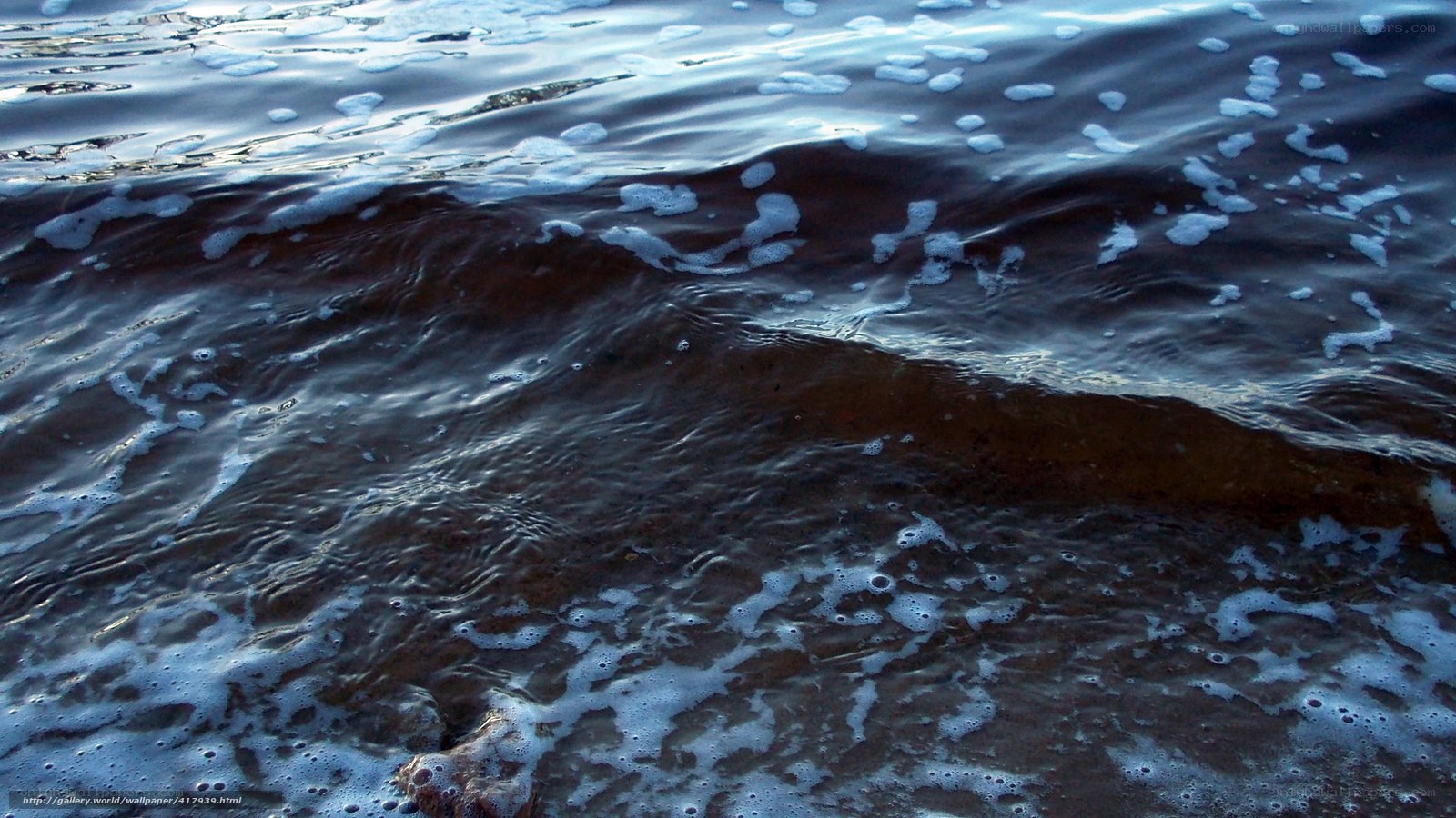foamy waves at dusk