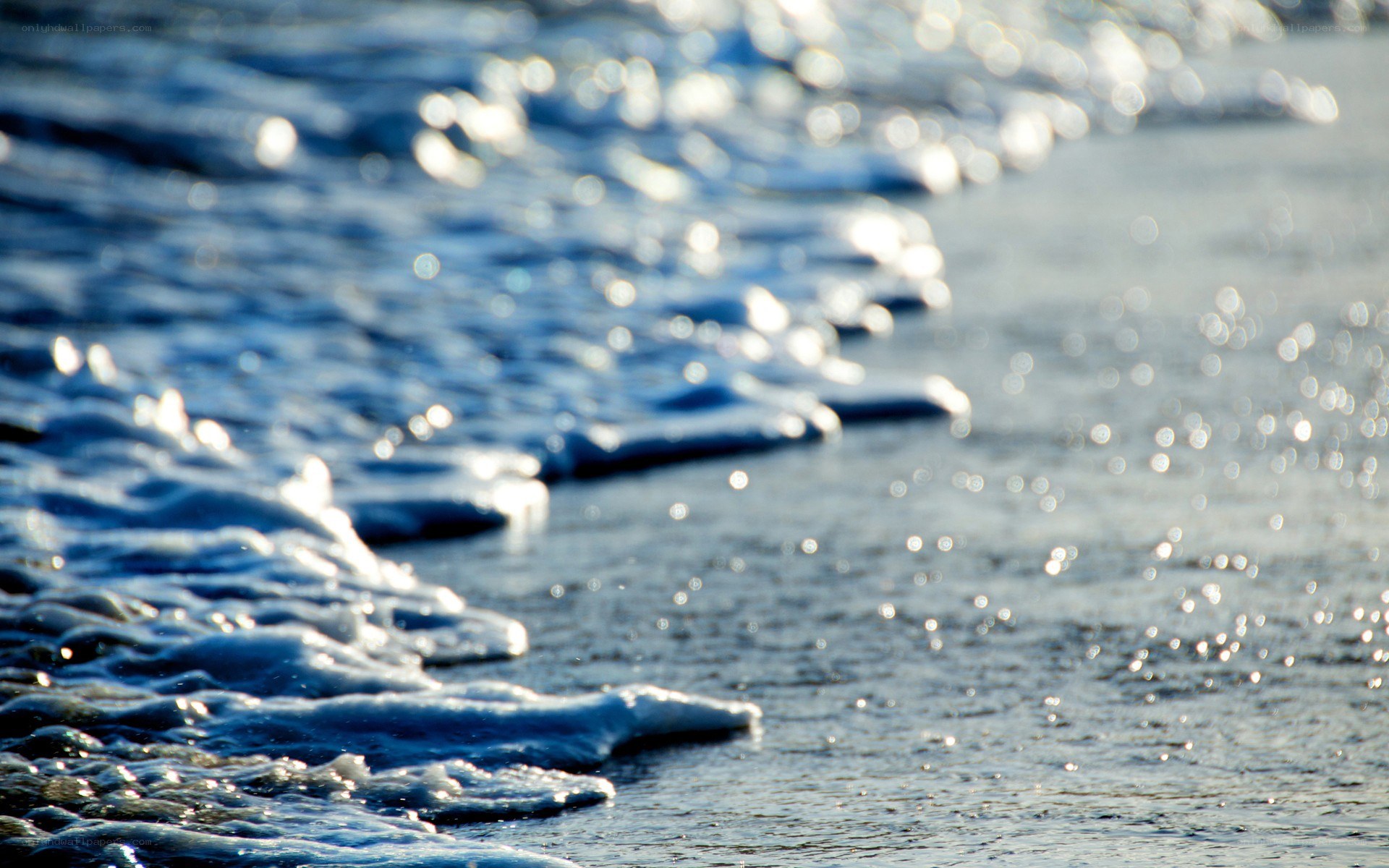 foamy waves on a beach