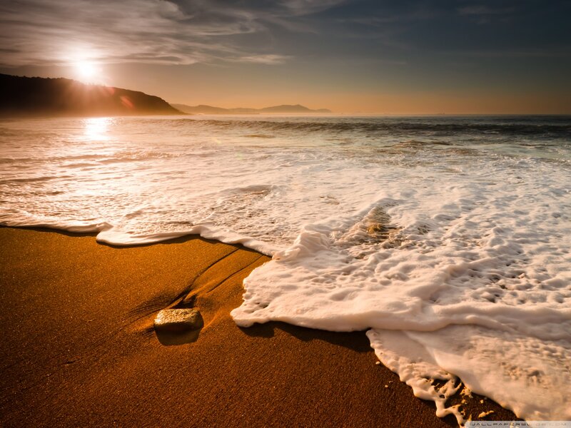 Foamy Waves on Beach — Gold, Serene, Sunset, Photograph, Sun, Sand, Rock