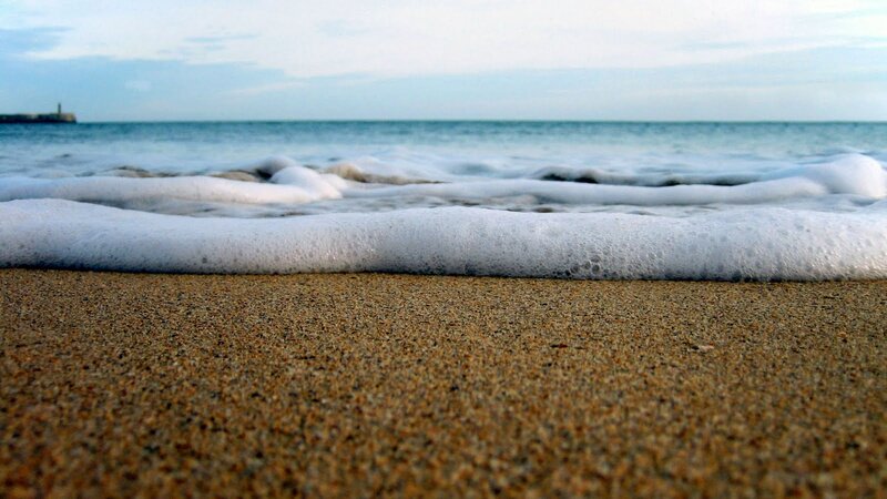 Foamy Waves on Sand