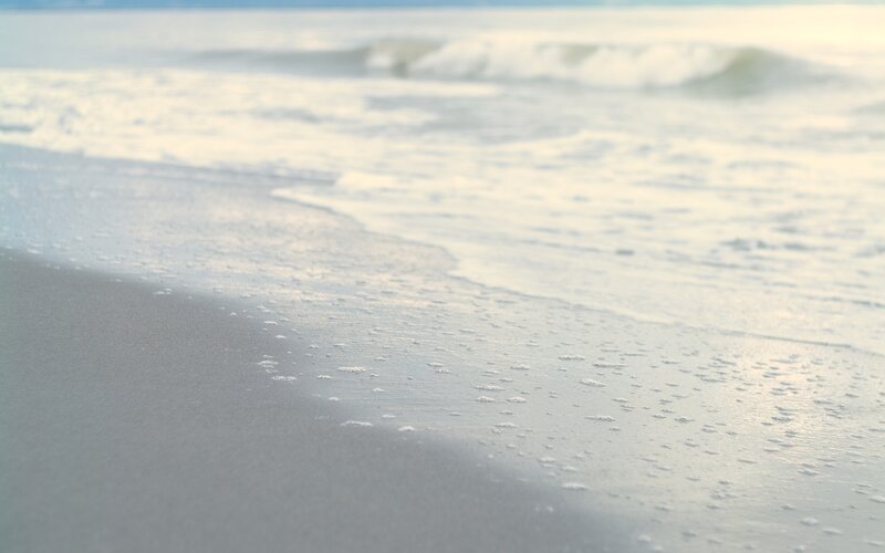 Foamy Waves on Sand — White