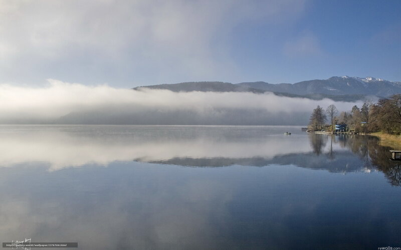 Fog over a mountain lake