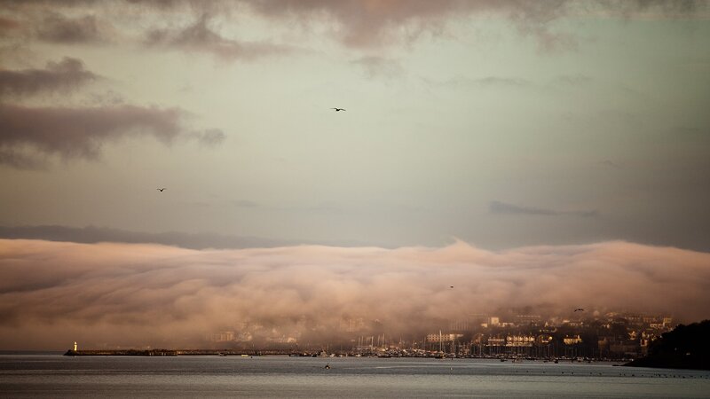fog over coastal town