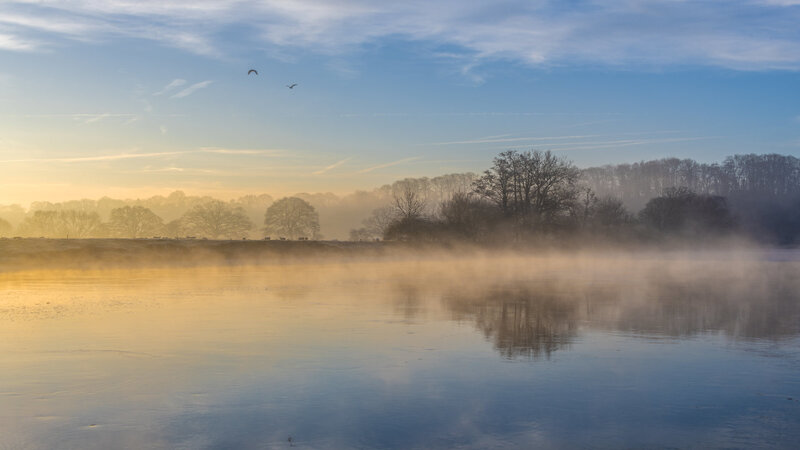 Fog over Frozen Lake